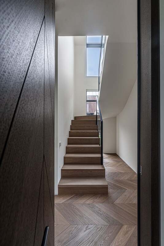 Chevron parquet flooring and bespoke stairs