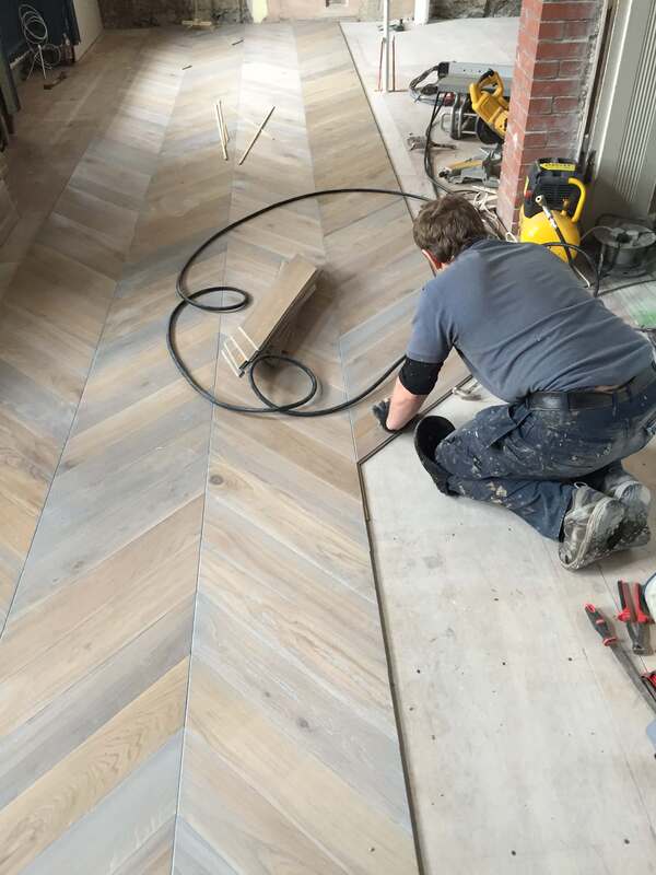 Grey Chevron Wood Flooring Installation