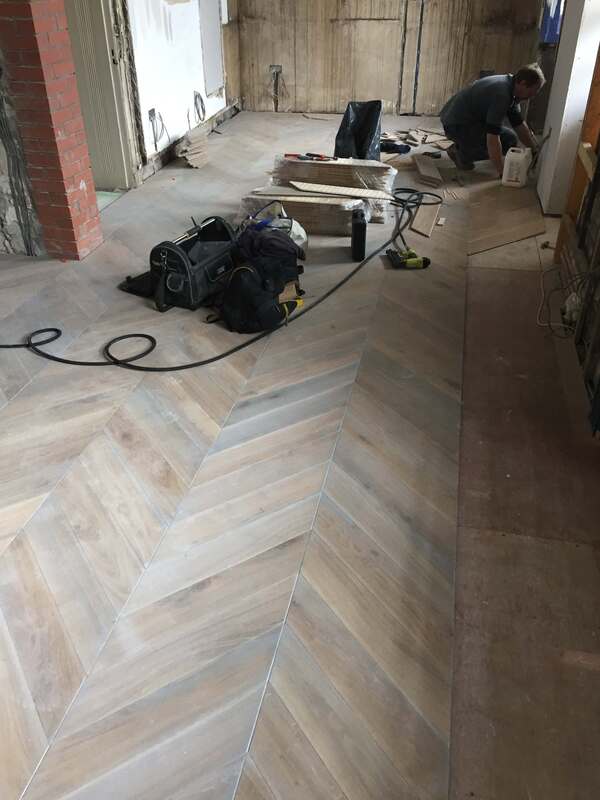 Grey chevron pattern wooden floors