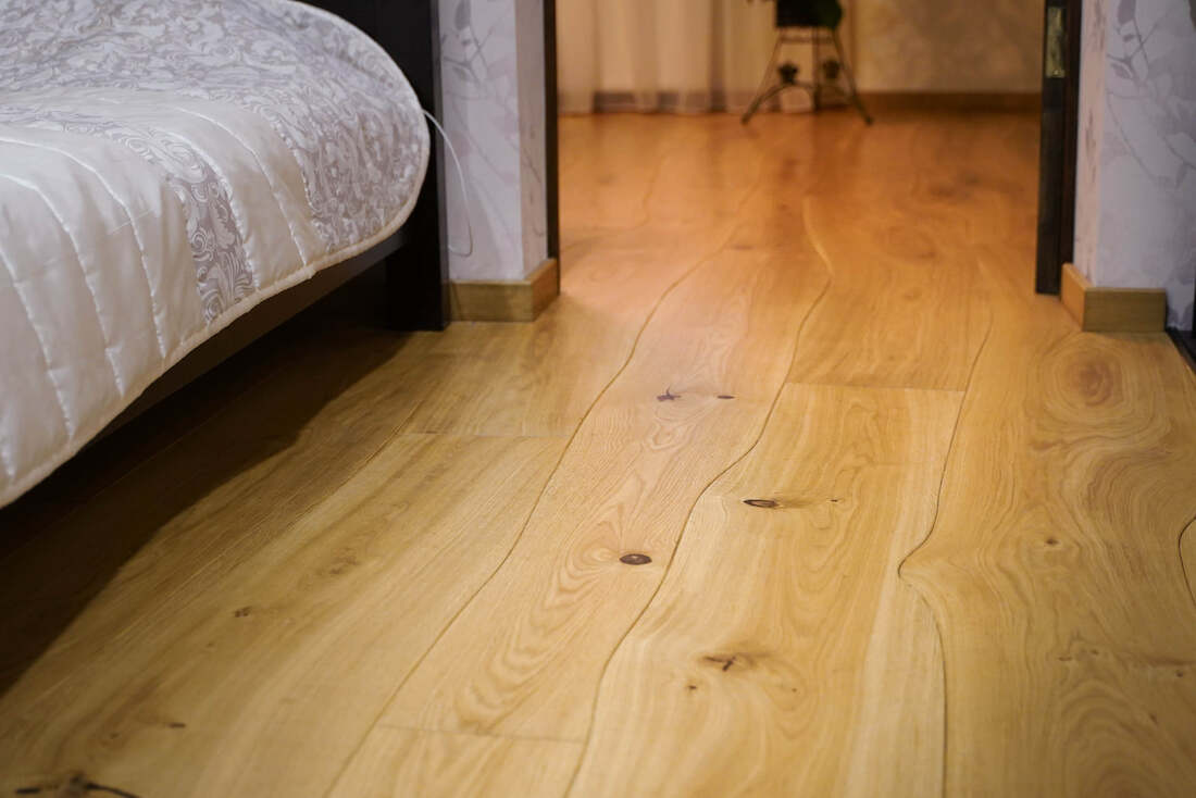 Natural curved edge wood floors