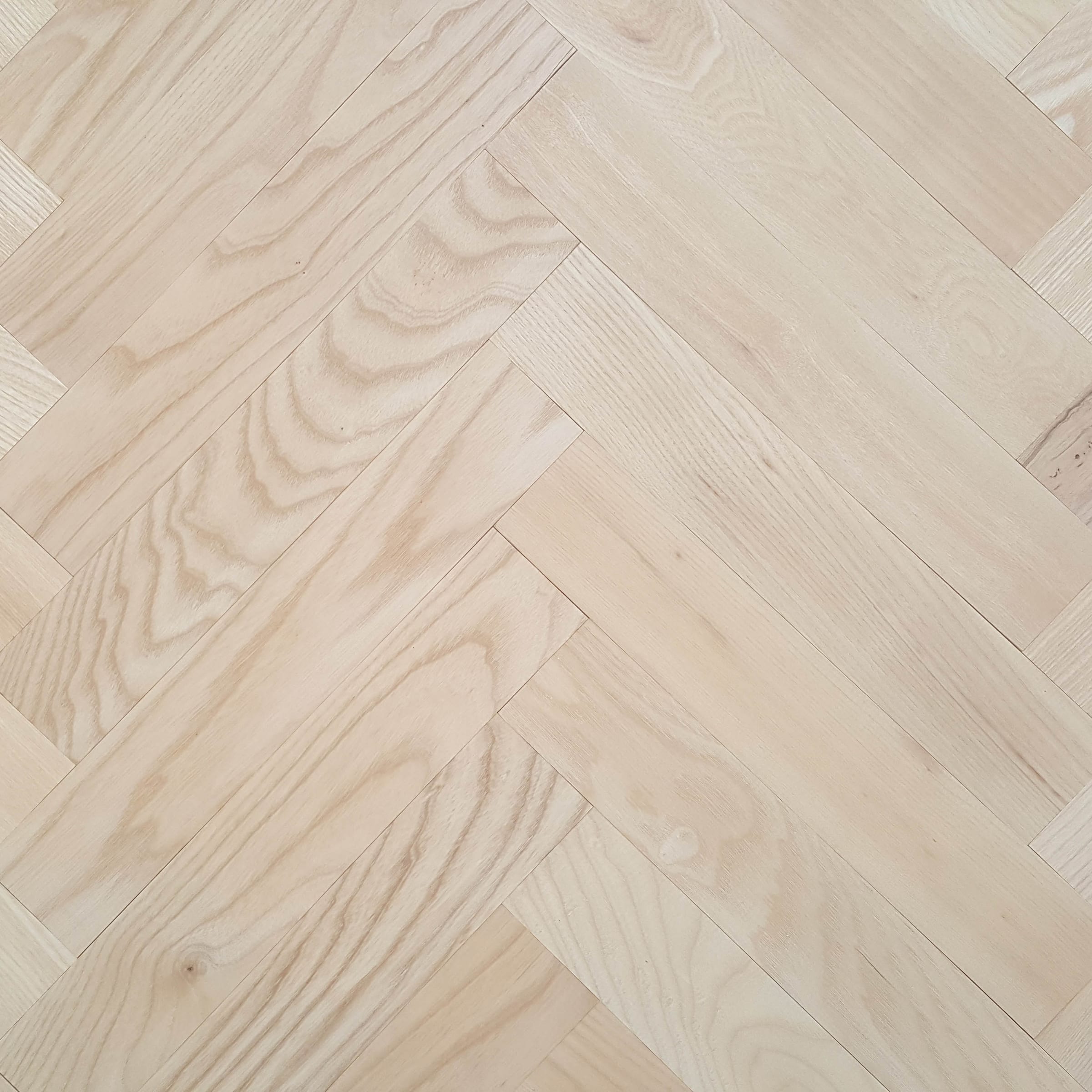 Raw Ash Herringbone Parquet