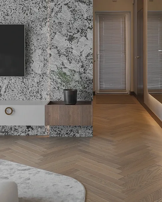 Oak herringbone parquet flooring in a modern hallway