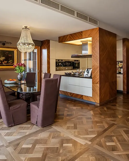Versailles parquet panels in an open-plan dining room and kitchen