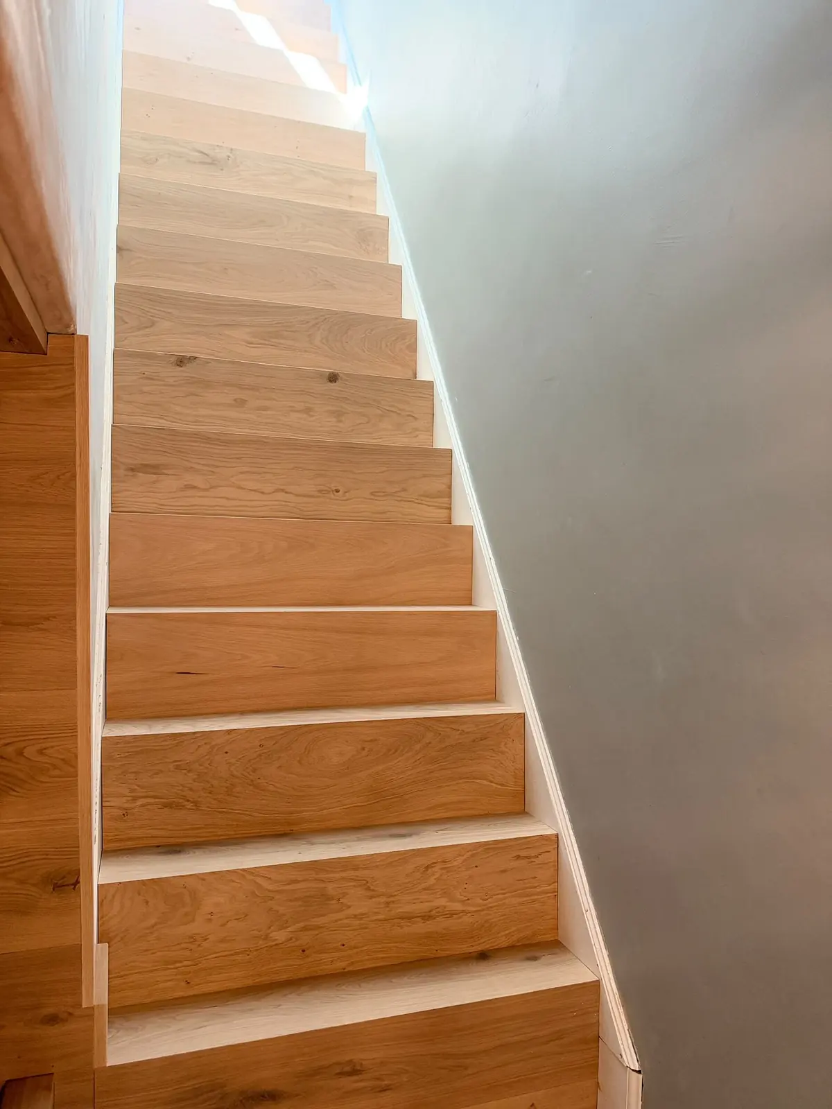 Bespoke oak stair treads with natural knots and grain