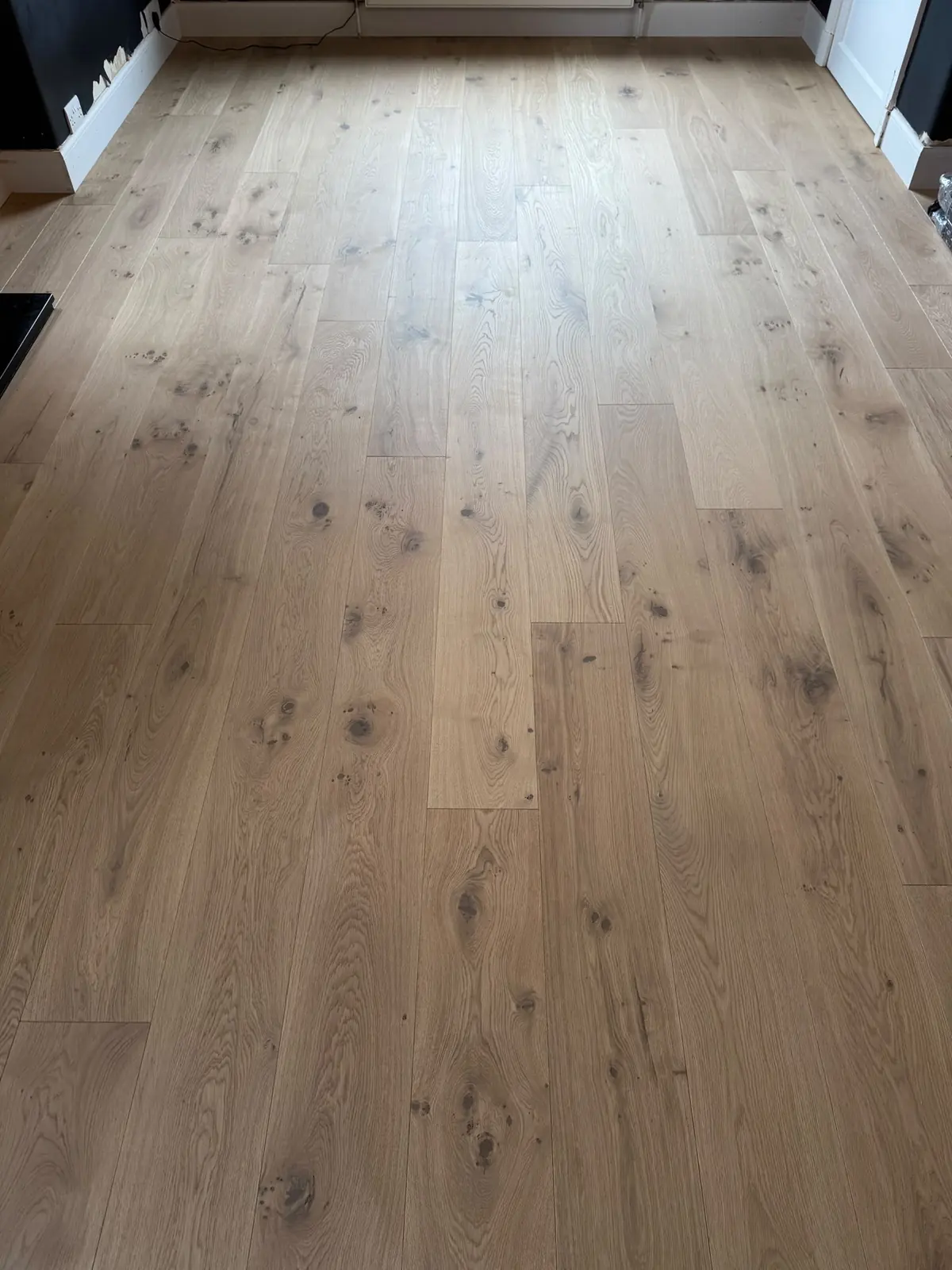 Gently brushed Sun Beam engineered oak wide planks with natural knots