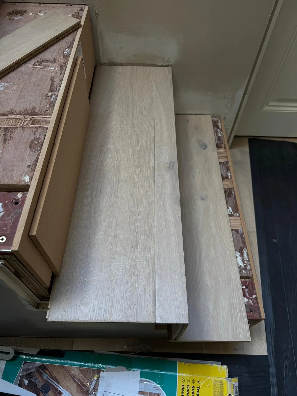 Bespoke oak tread dry-fitted on a step before gluing