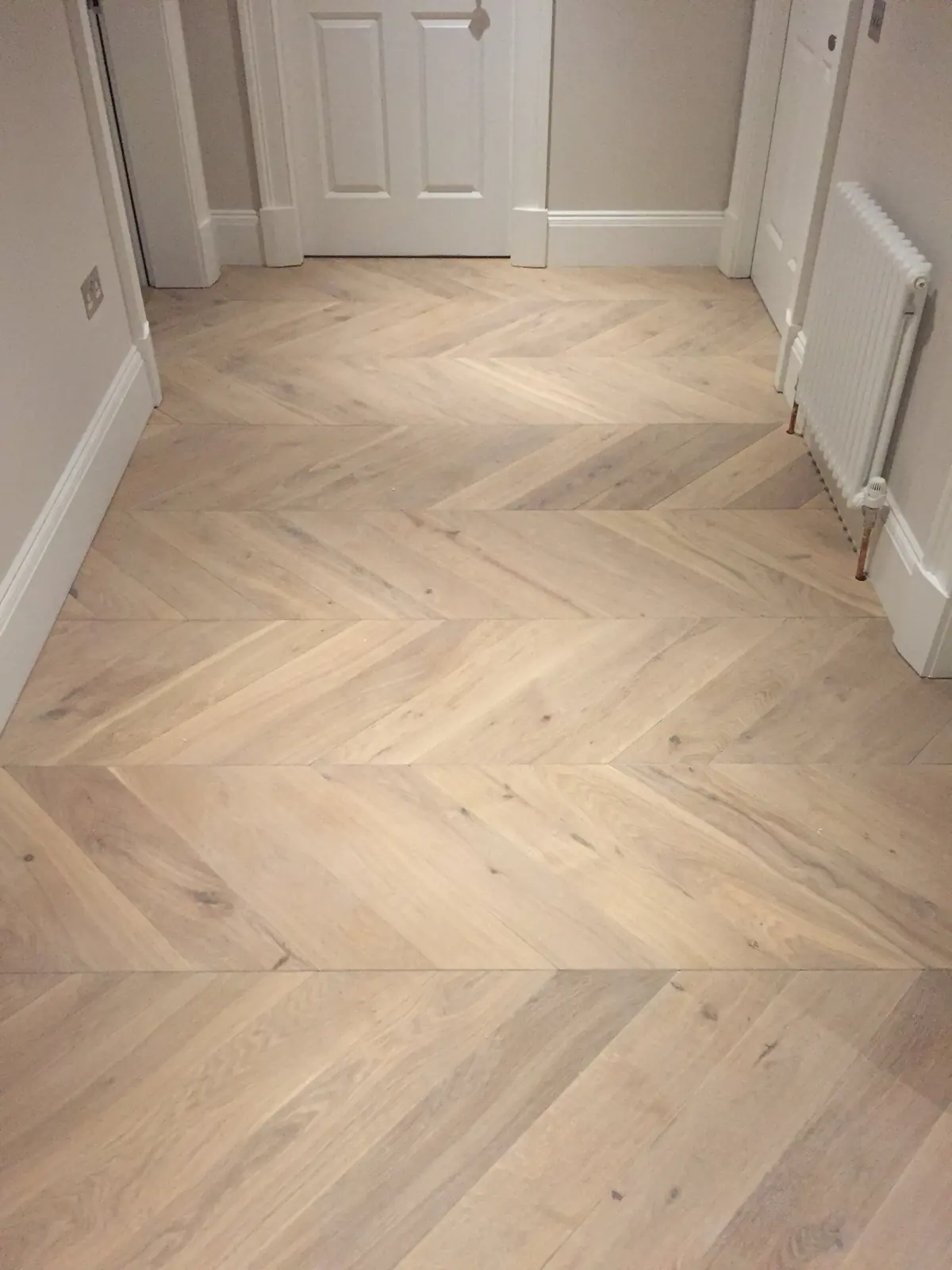 Light Oak chevron at a hallway junction