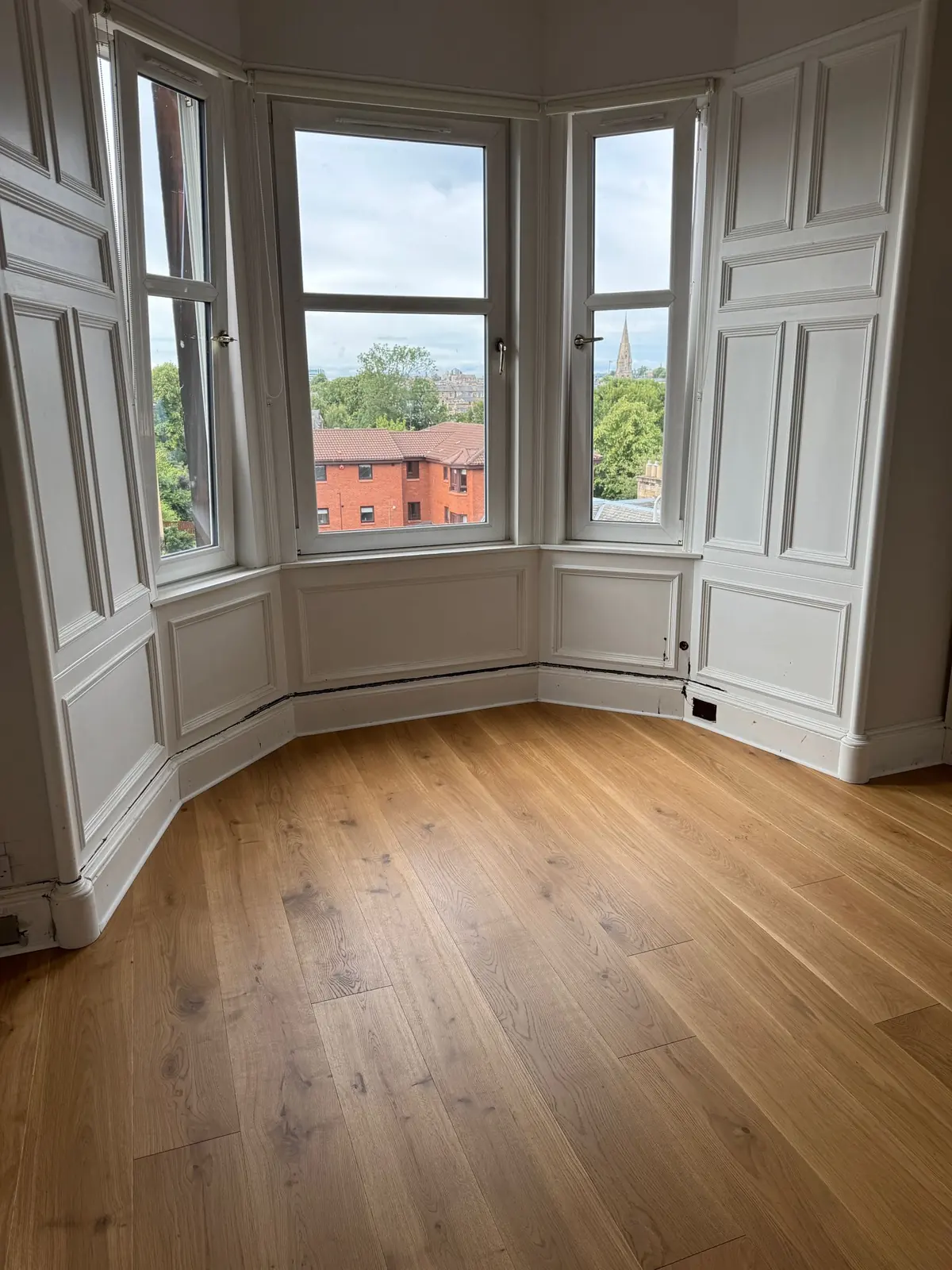 210mm oak planks in a panelled bay window