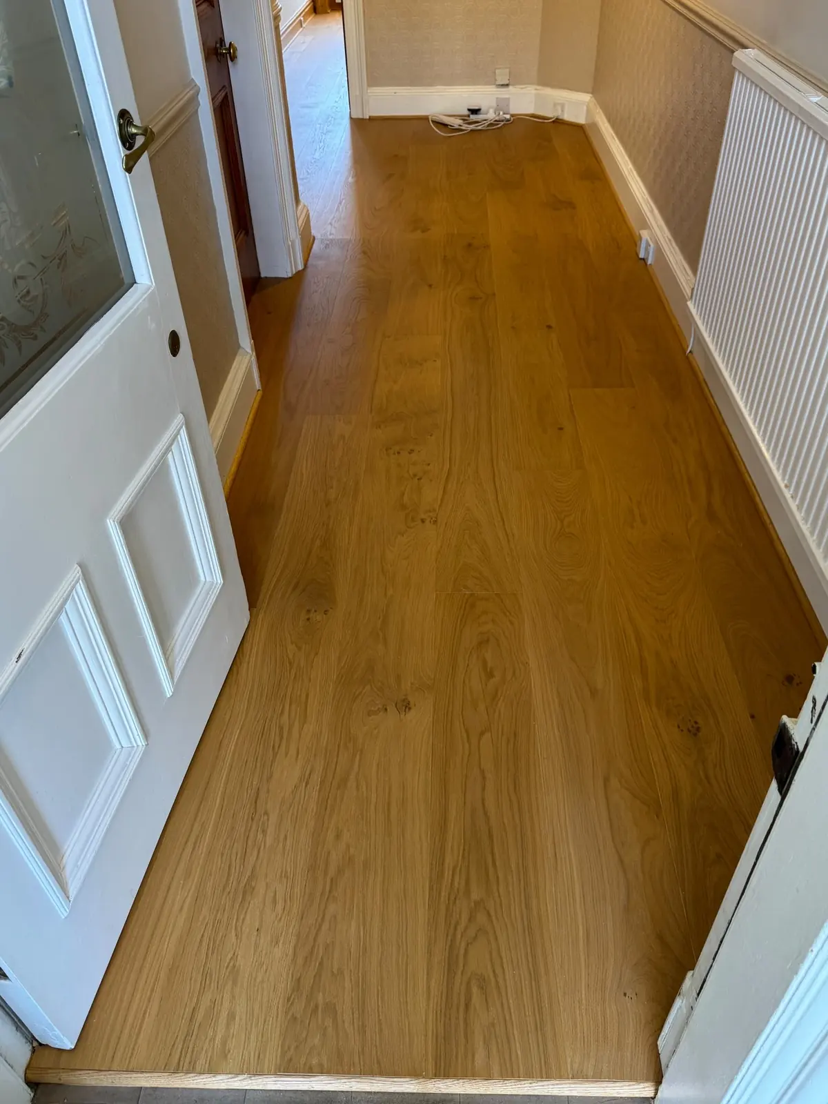 Oak planks at the front door threshold