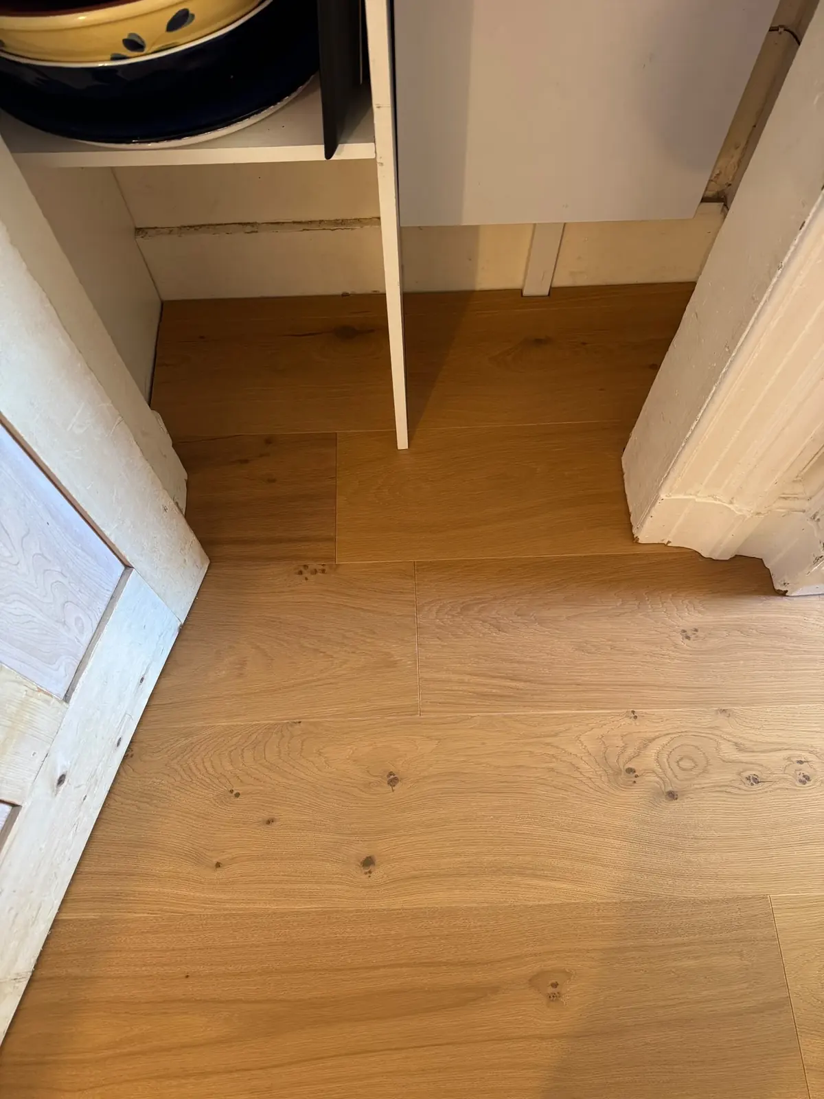 Oak planks fitted neatly into a small pantry cupboard